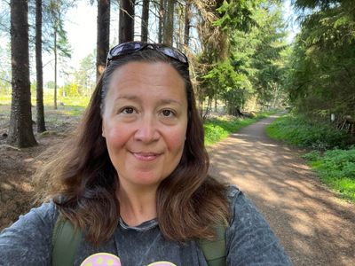 Jenny Brady walking in the woods